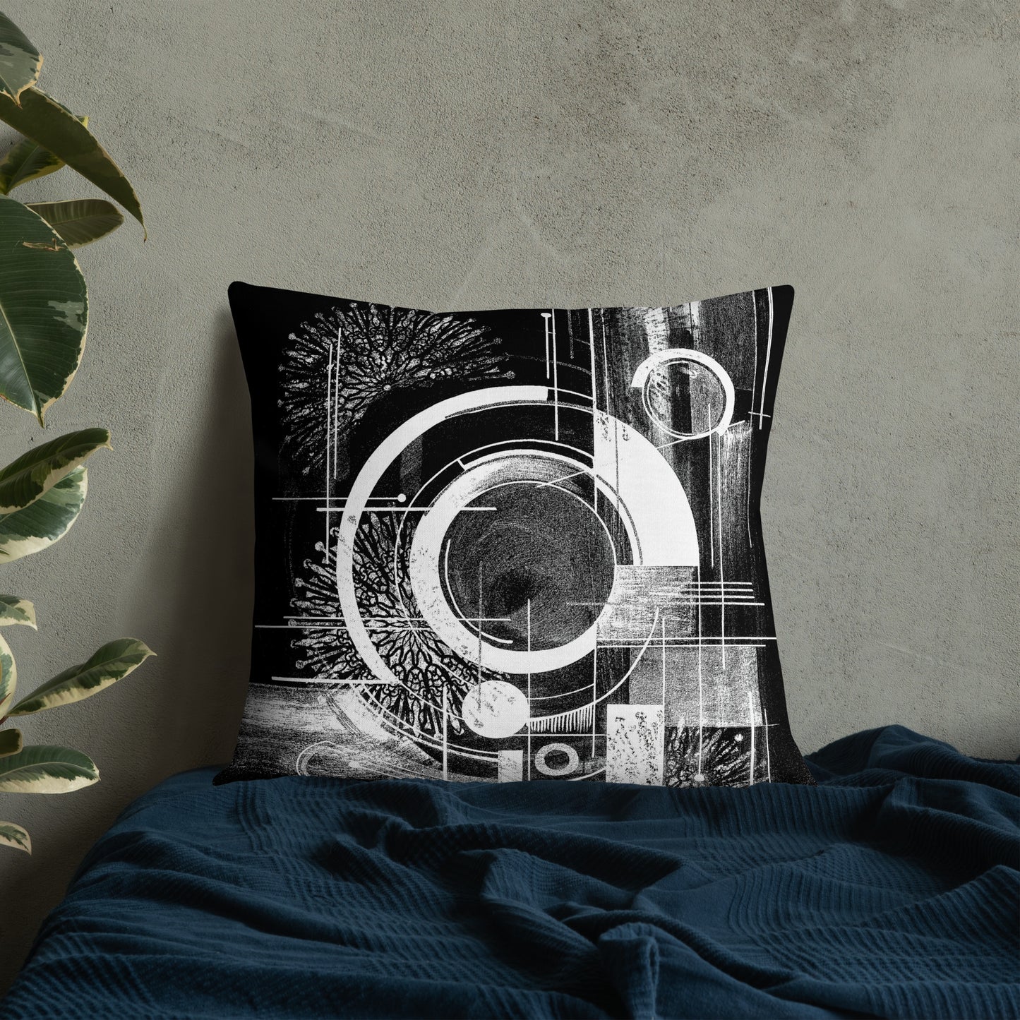 A square-shaped designer throw pillow with a black and white abstract geometric design, displayed against a neutral background with a plant and a blue textile. for gray blue green baige interior.  luxury cushions for sofa