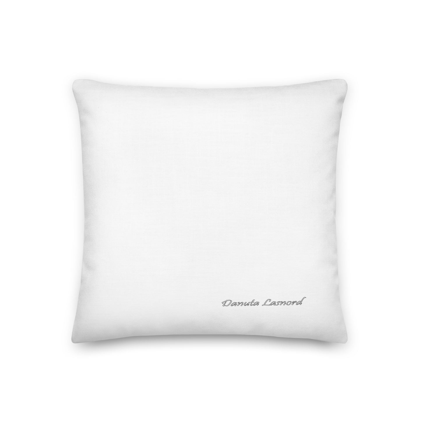 White pillow with 'Danuta Lasnord' branding. luxury cushions