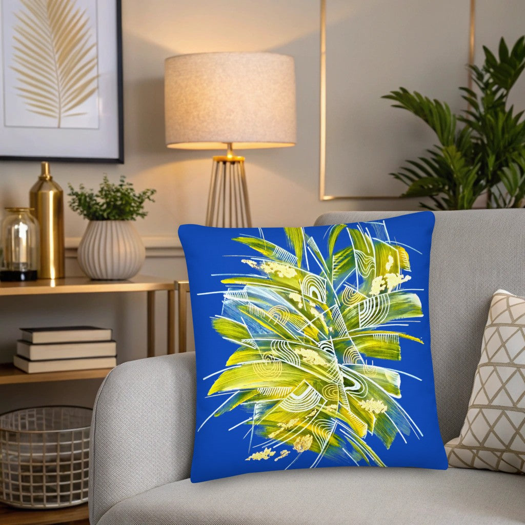 Decorative pillow with a tropical leaf design on a couch in a living room setting. Accent cushions for sofa. Modern home decor. Yellow blue design pillow