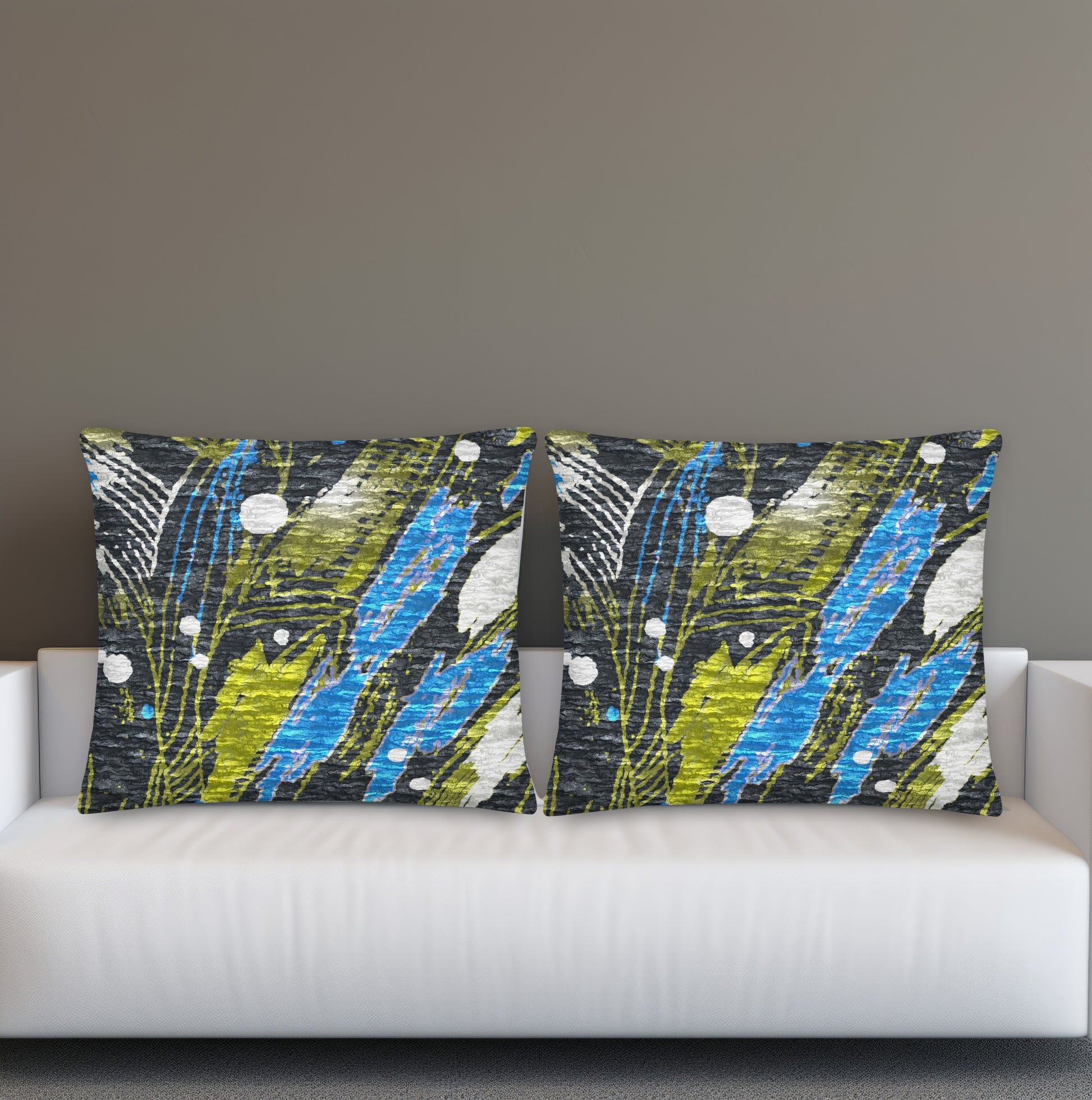 Decorative pillow with a floral pattern on a white sofa  for gray interior. Scandinavian designer cushion for cozy home