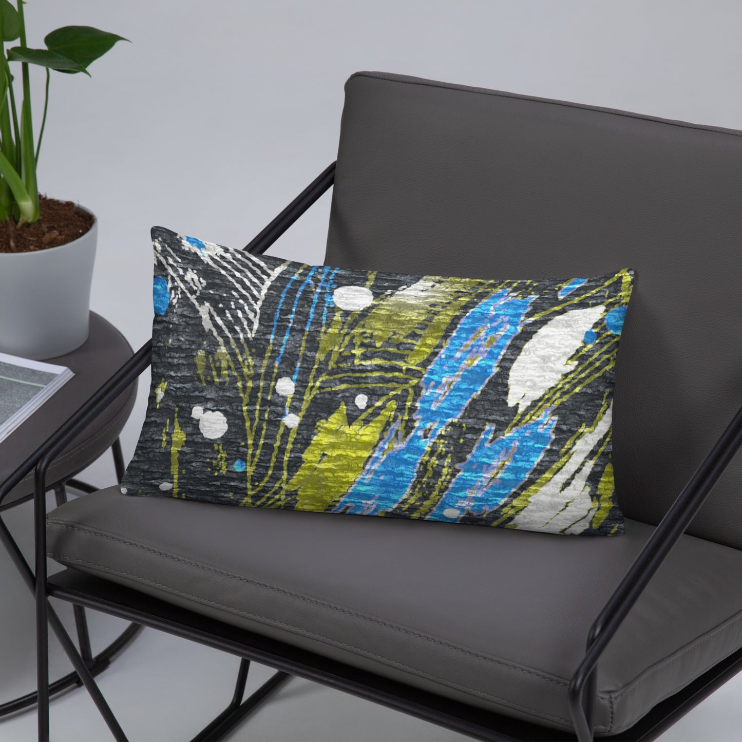A colorful geometric patterned premium pillow case. For gray and blue sofa  for modern interior